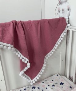 Kocyk z pomponikami brudny róż